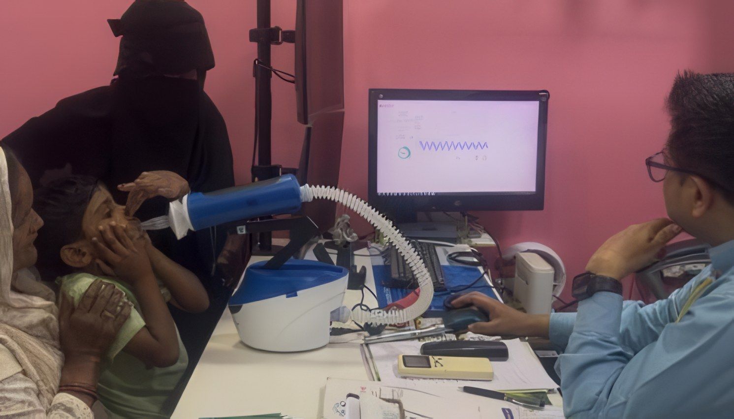 A lung function test, with the reading on screen